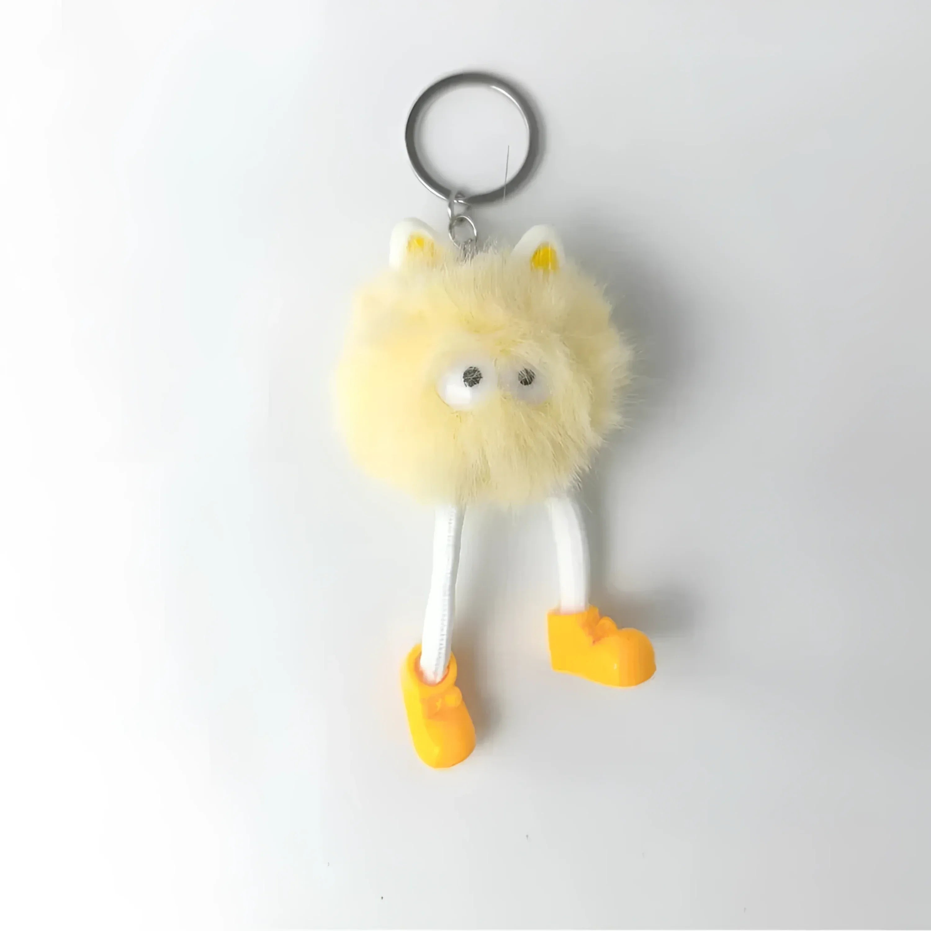 Charm Per Borsa Pom Pom Personaggio In Pelliccia Sintetica E Plastica Con Viso E Gambe Pendenti